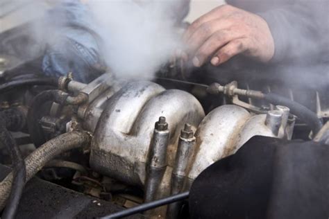 oil spilled on engine smoking|Car Smoking After Oil Change: Possible Causes and。